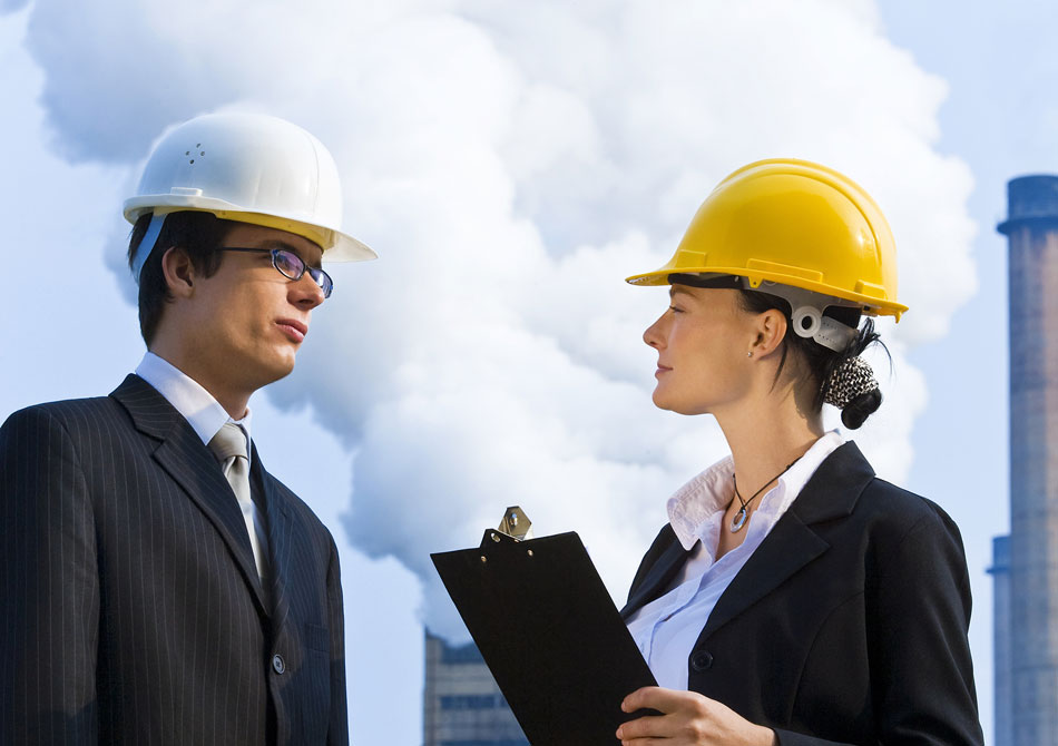 man and woman with hard hats