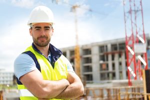 man with hard hat on building site